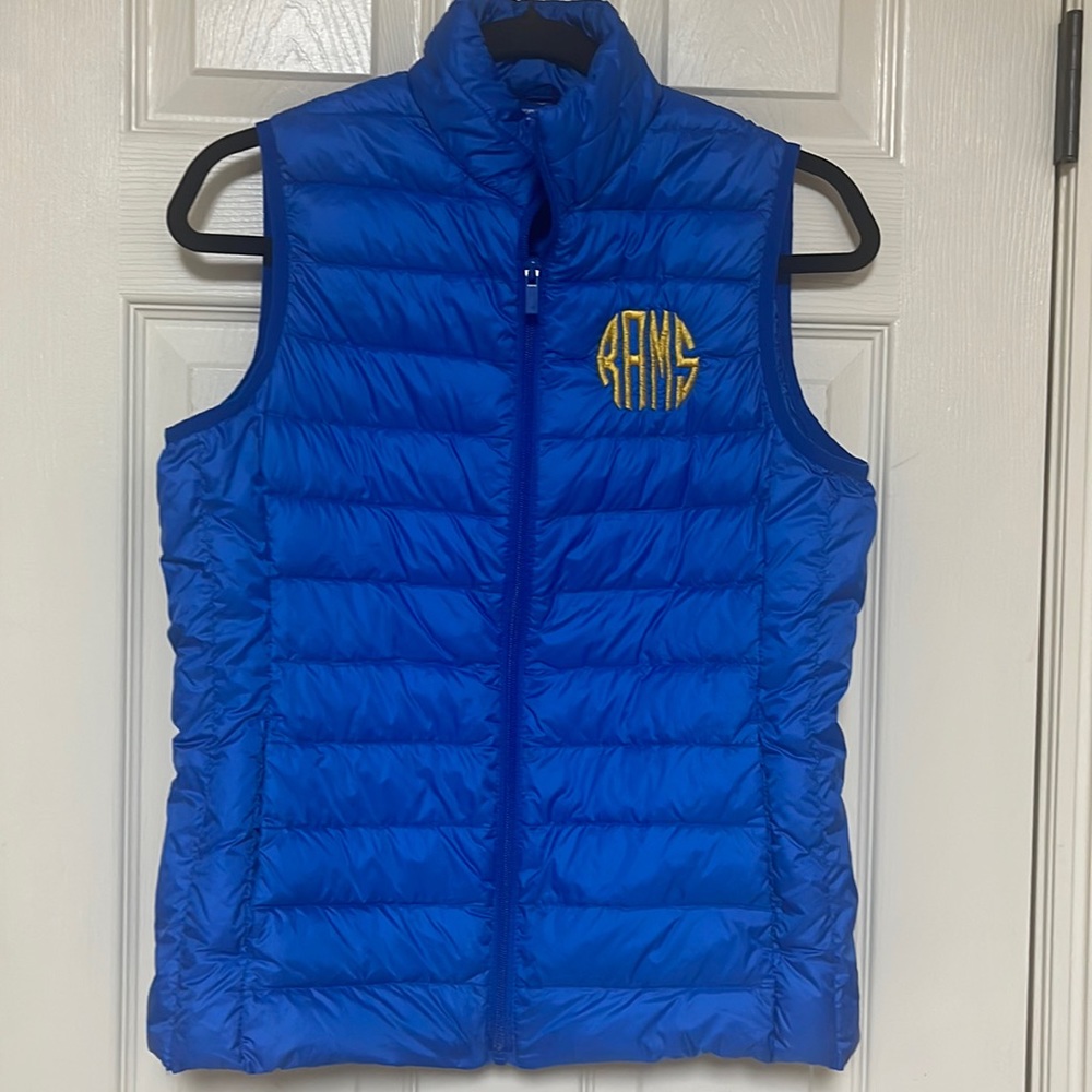 be inspired down packable vest. Blue/gold. Rams. Size medium. Very soft.